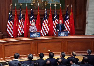Chinese Vice Premier Wu Yi (L) and US Treasury Secretary Henry Paulson deliver statements at the conclusion of the second meeting of the China-US Strategic Economic Dialogue in Washington, capital of U.S., May 23, 2007. [Xinhua/Rao Aimin] 