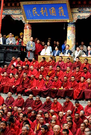 Lamas and guests attend the bhikku (monk) ordination at Tashilhunpo Monastery in Xigaze, southwest China's Tibet Autonomous Region, July 25, 2009. The 11th Panchen Lama Bainqen Erdini Qoigyijabu, one of the two most senior living Buddhas in Tibetan Buddhism, received the bhikku (monk) ordination here on Saturday. 