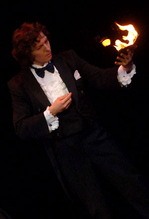 Greek magician Martino performs during the stage competition of the 24th World Magic Championships of the International Federation of Magic Societies (FISM) held in Beijing, capital of China, on July 27, 2009. [Gong Lei/Xinhua]