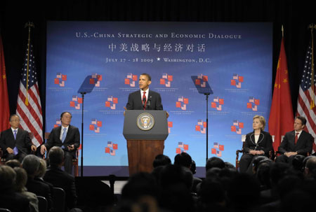 U.S. President Barack Obama (C) delivers a speech while Chinese Vice Premier Wang Qishan (2nd L), State Councilor Dai Bingguo (1st L), U.S. Secretary of State Hillary Clinton (2nd R) and U.S. Treasury Secretary Timothy Geithner (1st R) listen during the opening ceremony of the China-U.S. Strategic and Economic Dialogue (S&ED) in Washington, the United States, July 27, 2009. The China-U.S. Strategic and Economic Dialogue (S&ED), the first of its kind between the world's biggest developing country and biggest developed country, opened here on Monday. (Xinhua/Zhang Yan)