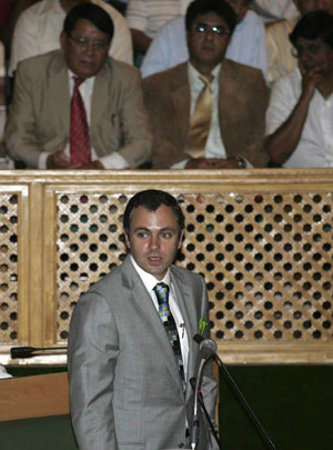 India-controlled Kashmir's top administrative official, Chief Minister Omar Abdullah, listens as the opposition Peoples Democratic Party senior leader (not in photo) accuses him of being involved in 2006 sex scandal during an ongoing assembly session in Srinagar, the summer capital of Indian-controlled Kashmir, July 28, 2009. Omar Abdullah announced on Tuesday to resign from the post in the floor of the assembly house following allegations leveled by an opposition member of his involvement in the infamous sex scandal that rocked the region in 2006. 
