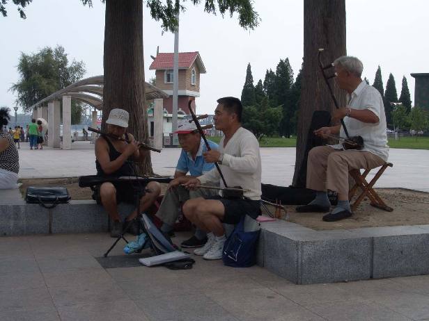 4) Street musicians are spread out just far enough to keep their music from overlapping. Most of them play in groups and are playing for fun instead of donations. Make sure to stop and have some fun with them; they seem to love playing for foreigners. 