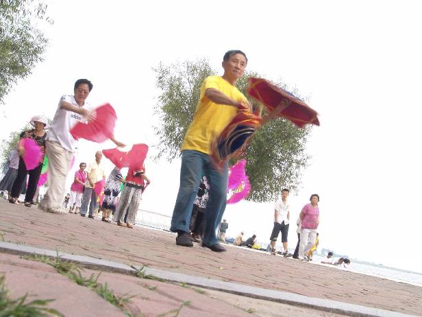 Dancers also perform in front of the river. Locals love to come and look over your shoulder as you stop to take pictures. Grab a piece of shade and enjoy the show. 