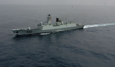 Xuzhou missile frigate sail on the Gulf of Aden, July 30, 2009. Two frigates and a supply ship from the Chinese navy, on another escort mission to fend off Somali pirates, joined with the second naval escort on Thursday.[Guo Gang/Xinhua]