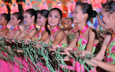 Actresses perform during a fishermen's festival in Lingao, a county of south China's Hainan Province, July 30, 2009. A festival was held here on Thursday as the midsummer moratorium on fishing in the South China Sea was ending. [Xinhua]