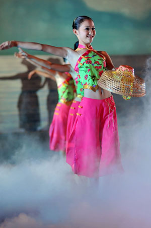 Actresses perform during a fishermen's festival in Lingao, a county of south China's Hainan Province, July 30, 2009. A festival was held here on Thursday as the midsummer moratorium on fishing in the South China Sea was ending. (Xinhua/Guo Cheng)