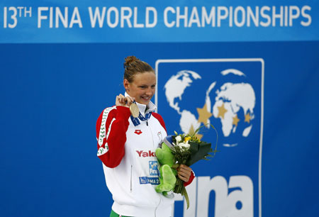 Katinka Hosszu of Hungary poses with her medal during the awarding ceremony of the women's 400m individual medley at the 13th FINA World Championships in Rome, Aug. 2, 2009. Katinka Hosszu won the gold with 4:30.31. 