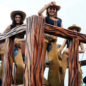 Contestants participate in a beauty contest of cowgirls to mark the traditional San Sebastian festival in Diriamba, southern agriculture and animal husbandry city of Nicaragua, Aug. 3, 2009. [Jairo Cajin/Xinhua]