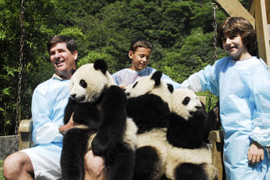 The family of Clinton Dines becomes involved in the Panda protection and research program initiated during his time at BHP Billiton China. [Shanghai Daily]