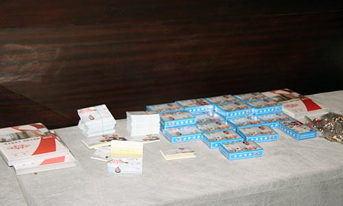 DVDs, Playing cards, brochures and pins on anti-stigma and prevention messages. [Li Shen/China.org.cn]