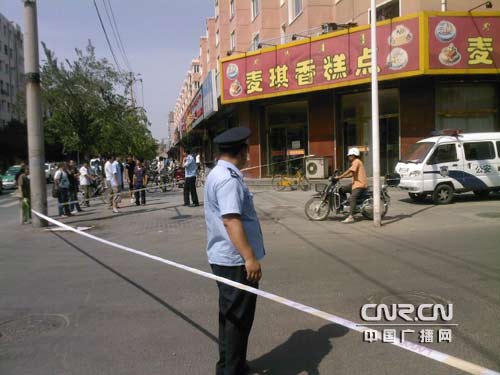 Police officers maintain order on the site August 5, 2009. A total of 202 people fell ill Wednesday after an ammonia gas leak at a pharmaceutical plant in north China's Inner Mongolia Autonomous Region.