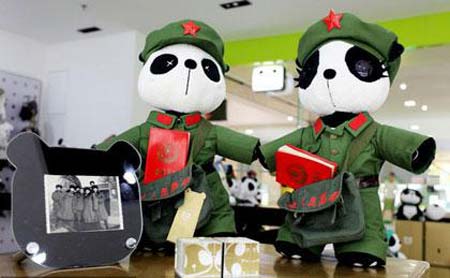 A selection of panda dolls and costumes have been selling like hot cakes among Beijing's youth.[CRIENGLISH.com]