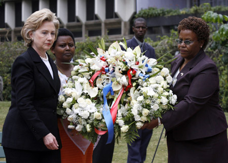 U.S. Secretary of State Hillary Clinton prepares to lay a wreath in marking the 11th anniversary of the bombing of the U.S. embassy in Nairobi, August 6, 2009. U.S. embassies in Dar es Salaam and Nairobi, Kenya, were bombed by suspected al-Qaeda militants on August 7, 1998.[Xinhua/Reuters]