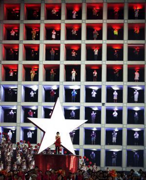 Performers say the pledge during the National Day parade in Singapore August 9, 2009.[Xinhua/Reuters]