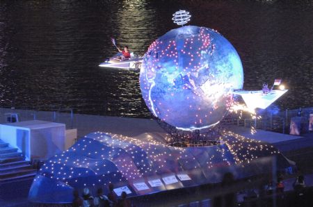 Artists perform during the national day celebration in Singapore, Aug. 9, 2009. Singapore, a city state with a population of 4.84 million, marked its 44th birthday with a massive party at the Marina Bay floating platform on Sunday night.[Zhang Yongxing/Xinhua]