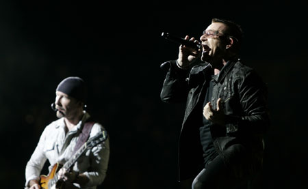 Bono (R) and Edge of U2 perform during their 