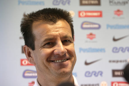 Brazil's coach Dunga smiles during a news conference in Tallinn August 11, 2009. Brazil will play a friendly soccer match against Estonia on Wednesday.