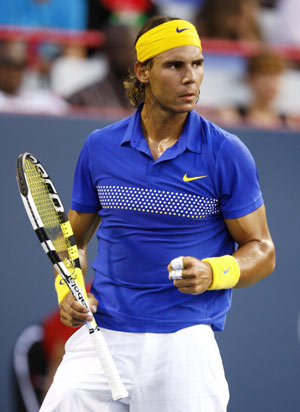 Rafael Nadal of Spain celebrates a point against compatriot David Ferrer at the Rogers Cup tennis tournament in Montreal August 12, 2009.
