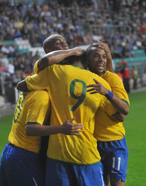 Brazil's players celebrate after scoring agaist Estonia in Tallinn, Estonia, Wednesday, Aug.12, 2009. Brazil beat Estonia 1-0 at their friendly soccer match.