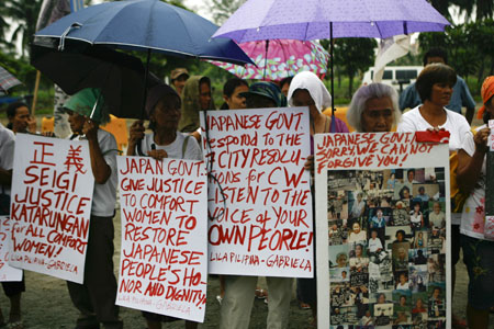 Filipino comfort women hold a demonstration outside the Japanese Embassy in Manila, capital of the Philippines, Aug. 12, 2009, demanding compensation and apologies from the Japanese government for the systematic rape of women by its imperial army during the Second World War.