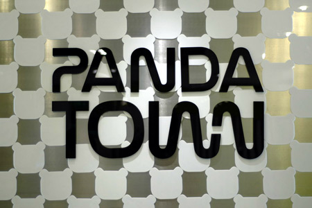 Based on the previous design of the two lovers, they redesigned the doll into a panda and turned it to the symbol of their company, Panda Town.