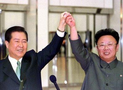 This 2000 file photo shows North Korean leader Kim Jong-Il (right) and South Korean President Kim Dae-Jung during a historic summit between the two countries in the North Korean capital city of Pyongyang. Kim Dae-Jung, a renowned democracy campaigner who survived assassination attempts and a death sentence to win South Korea's presidency and the Nobel peace prize, has died aged 85.[Yonhap/Pool/AFP/File] 