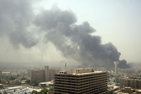 Smoke billows from the scene of a car bomb in front of the foreign ministry in central Baghdad. At least 45 people were killed in a wave of attacks in Baghdad, including two massive truck bombings, on the bloodiest day in the capital for almost two months, health and security officials said.