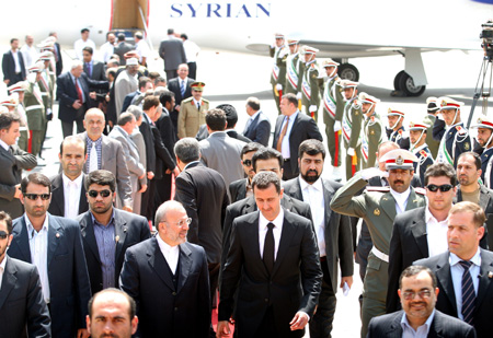 Syrian President Bashar al-Assad arrives at the airport in Teheran, capital of Iran, on Aug. 19, 2009. Bashar al-Assad started his visit to Iran on Wednesday.