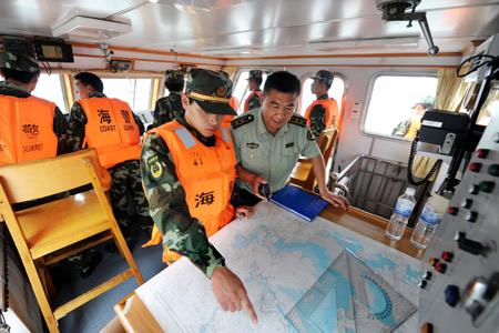 Chinese marine corps attend a drill in an area of the Yellow Sea in China, Aug. 20, 2009. [Li Ziheng/Xinhua] 