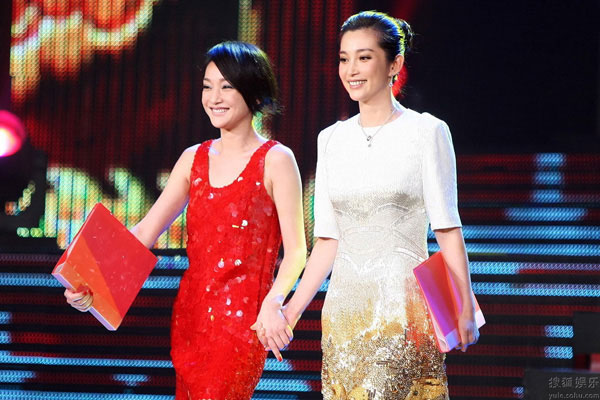 Zhou Xun (L) and Li Bingbing (R), heroines of 'The Message', attend a celebratory event in Beijing on Wednesday, August 19, 2009, for the upcoming screening of 40 films to commemorate the 60th Anniversary of People's Republic of China.