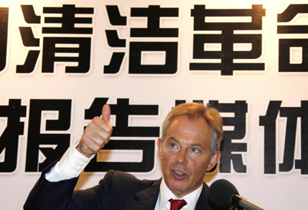 Tony Blair, former British prime minister and a partner of the environmental organisation The Climate Group, listens to a question during a media conference in Beijing August 20, 2009.