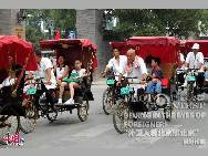<i>Taking a ride around Hou Hai by rickshaw</i> by Kien Fan Cesar Hung Sam (Venezuela)