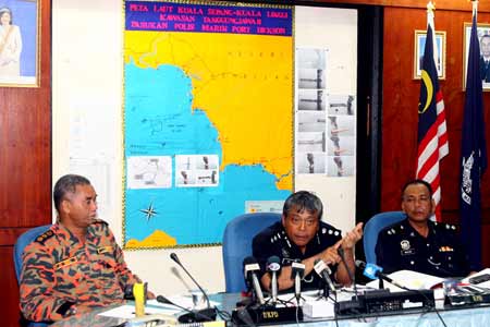 Malaysian police give a news conference in Port Dickson in Negri Sembilan, Malaysia, Aug. 21, 2009. 