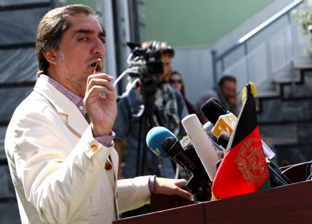 Afghan presidential candidate Abdullah Abdullah speaks during a news conference in Kabul, capital of Afghanistan, Aug. 23, 2009. Afghan incumbent president Hamid Karzai's main rival Abdullah Abdullah on Sunday said that a big fraud is underway to affect the outcome of the country's recently held presidential election.[Xinhua]