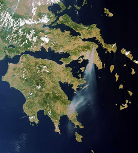 This NASA handout shows a satellite image of smoke trails from the fires consuming several parts of the Greek capital of Athens, Aug. 23, 2009. (Xinhua/AFP Photo)