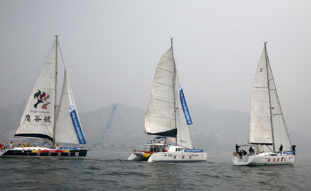 Sailors set off from Xinghai Bay during the Mayor Cup Dalian to Qingdao Sailing Rally in Dalian, a coastal city of northeast China's Liaoning Province, Aug. 25, 2009. 