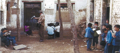 Michelangelo Antonioni and his crew filming in a Henan province village for his documentary Chung Kuo in 1972.