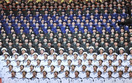 Soldiers perform a patriotic song in Beijing, China, on Aug. 26, 2009. 