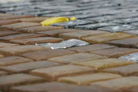 Packages of cocaine are displayed near Cartagena, port city in northern Colombia, Aug. 28, 2009. Colombian Marines Corps captured 553 kilograms of cocaine here on Friday. 