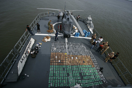 Packages of cocaine are displayed near Cartagena, port city in northern Colombia, Aug. 28, 2009. Colombian Marines Corps captured 553 kilograms of cocaine here on Friday.