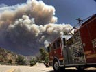 California wildfire burns virtually out of control