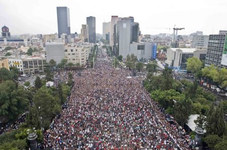 Michael Jackson's fans dance 'Thriller' in celebration of the late singer's 51st birthday in Mexico City, Mexico, on Aug. 29, 2009. According to the organizers, 12,937 Mexicans set the new Guinness World Record on a mass performance of Michael Jackson's famed 'Thriller' dance on Sunday.