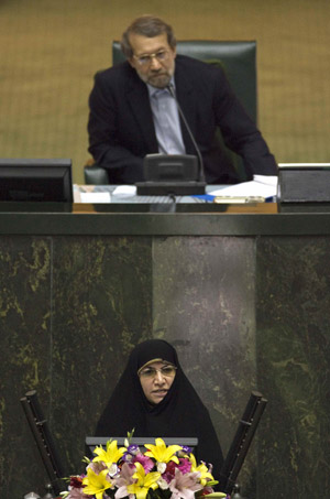 Nominee for Education Minister Sousan Keshavarz (bottom) speaks to lawmakers in parliament in Tehran, as Speaker of Parliament Ali Larijani looks on August 31, 2009.(Xinhua/Reuters Photo)