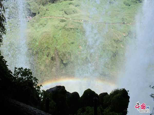 The Huangguoshu waterfall, the largest and one of the six most beautiful waterfalls in China, is located on the Baishui River in the Bouyei Miao ethnic minority Autonomous County, southwest China's Guizhou Province. The Huangguoshu waterfall runs down through plenty of rocks and is surrounded by steep mountains. The waterfall is 30 meters wide (can reach 40 meters in summer) and has a fall of 66 metres. 