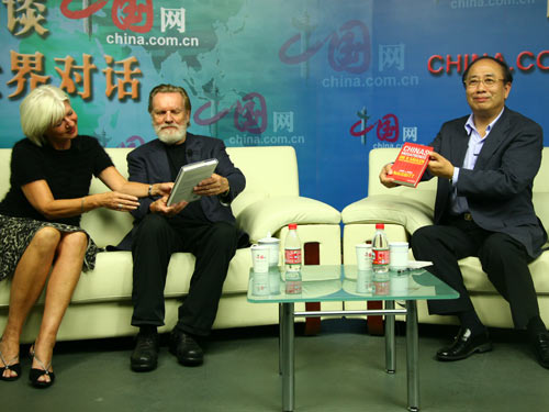 Chairman of the Foreign Affairs Committee of the CPPCC and Former Minister of the SCIO, Zhao Qizheng (R), American Futurist John Naisbitt (C) and his wife Doris Naisbitt (L). 