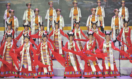 People perform a patriotic song during a vocal concert in Beijing, China, Sept. 4, 2009.(Xinhua/Xie 