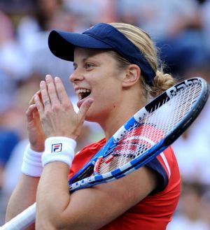 Kim Clijsters of Belgium celebrates her win over Venus Williams of the U.S. at the end of their match at the U.S. Open tennis tournament in New York, September 6, 2009. Clijsters won a roller-coaster of a match 6-0, 0-6, 6-4.(Xinhua/Reuters Photo)