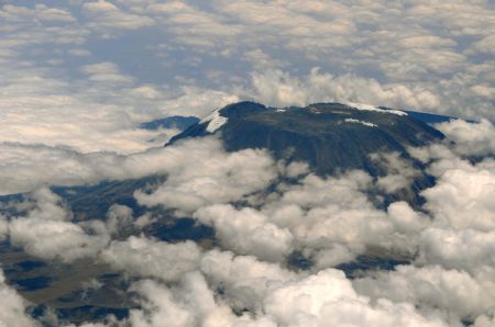 The aerial photo taken on Sept. 4, 2009 shows the snowless top of Mount Kilimanjaro.(Xinhua/Xu Suhui)