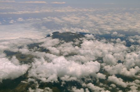 The aerial photo taken on Sept. 4, 2009 shows the snowless top of Mount Kilimanjaro.(Xinhua/Xu Suhui)