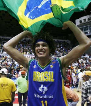 Anderson Varejao of Brazil celebrates after defeating Puerto Rico in their men's FIBA Americas Championship gold medal final basketball game in San Juan September 6, 2009.(Xinhua/Reuters Photo) 
